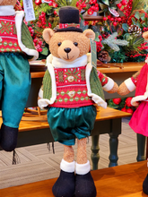 Urso menino com cartola e suéter verde 56cm