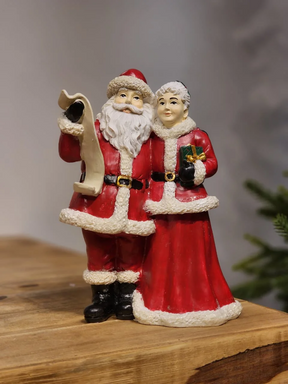 Papai e Mamãe Noel com lista de presentes 23,5cm