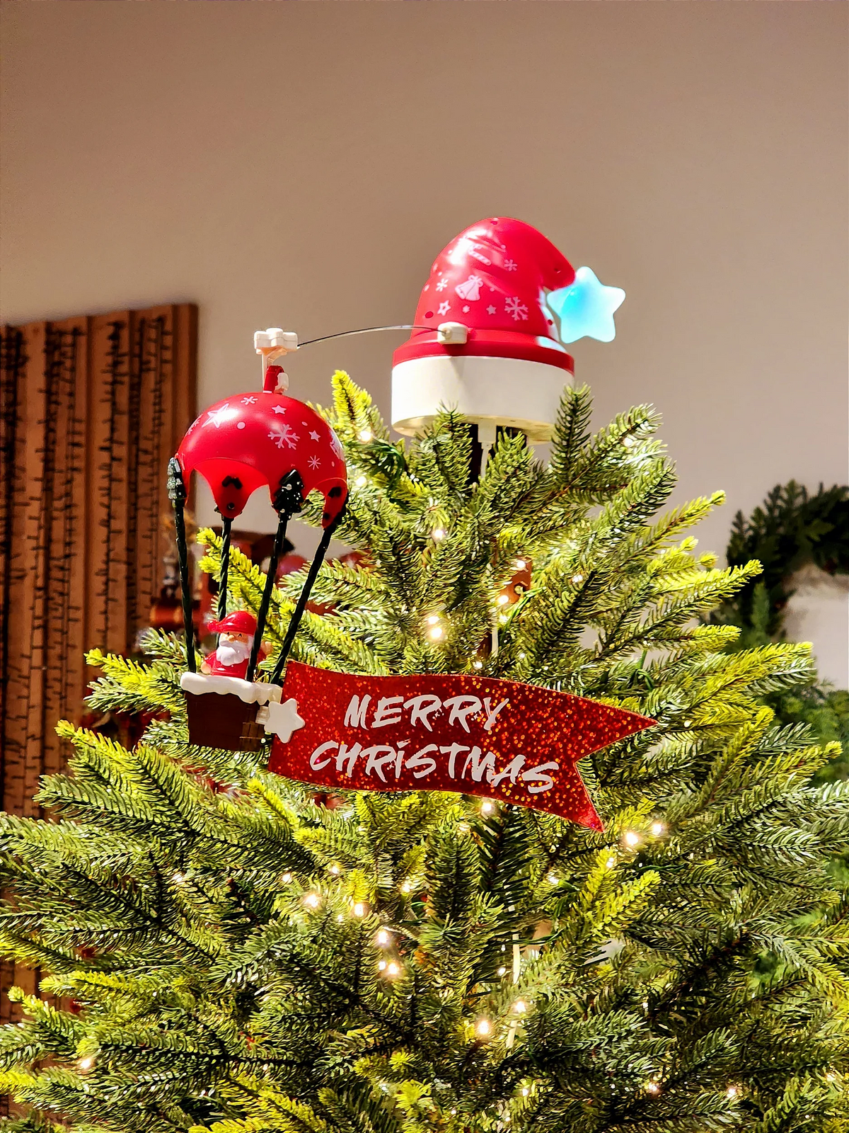 Ponteira para árvore com balão do Papai Noel com movimento luz e som